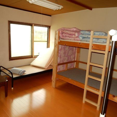 Guest House Nisshin Найоро Номер фото