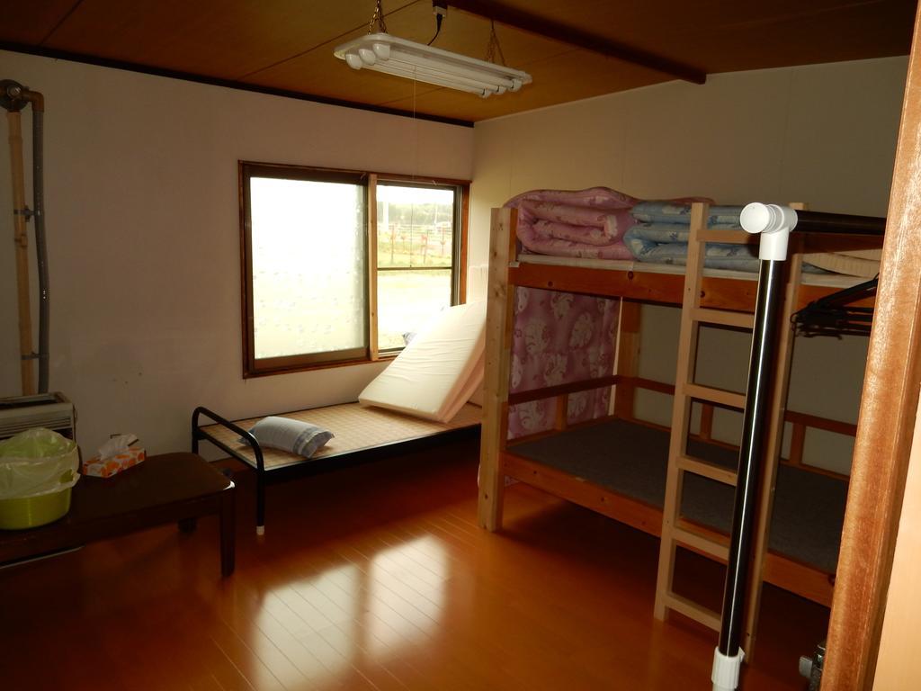 Guest House Nisshin Найоро Номер фото