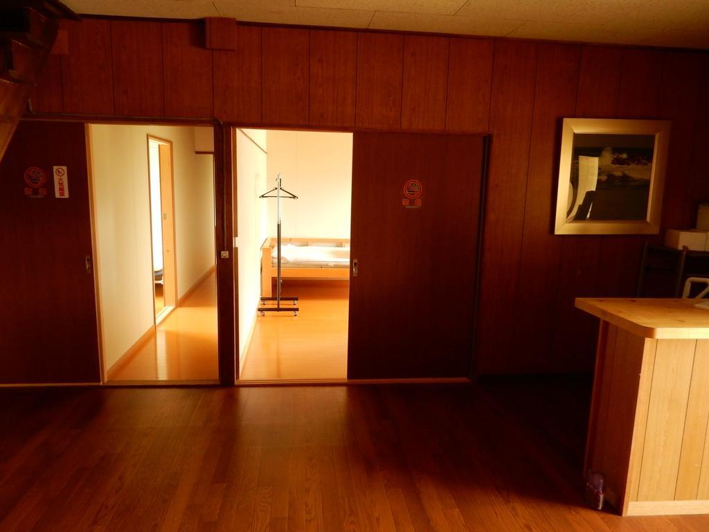 Guest House Nisshin Найоро Номер фото