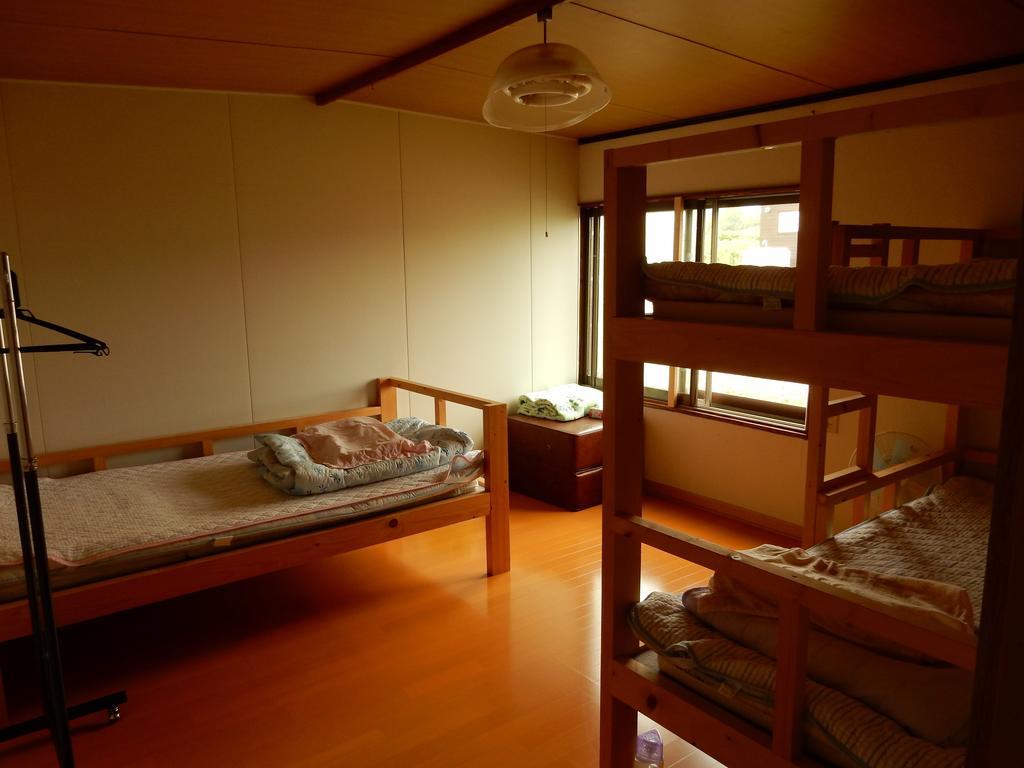Guest House Nisshin Найоро Номер фото