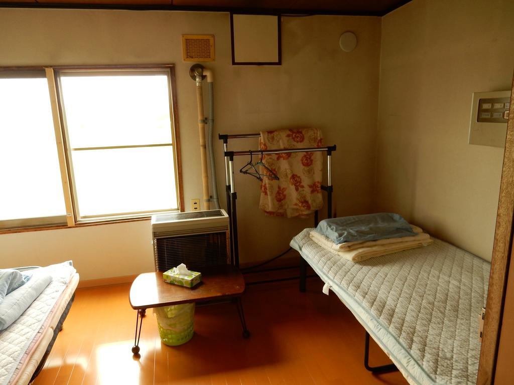 Guest House Nisshin Найоро Номер фото